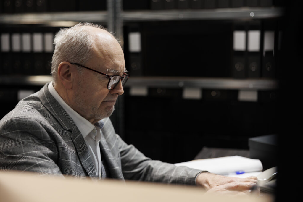 A forensic psychologist working on his clients' cases