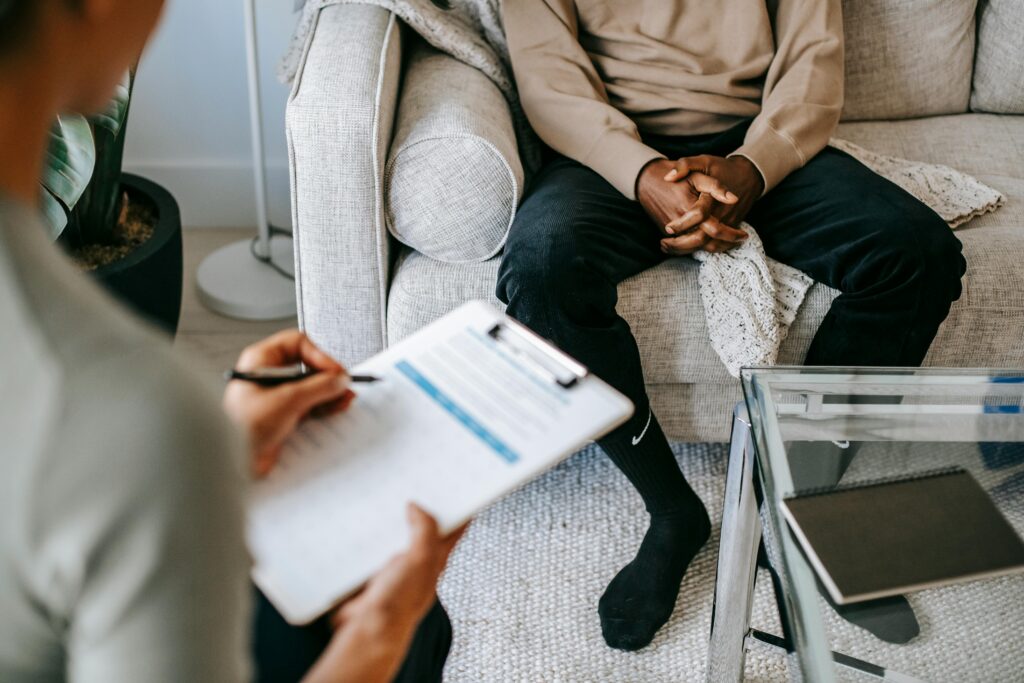 A forensic psychologist conducting an assessment on the patient