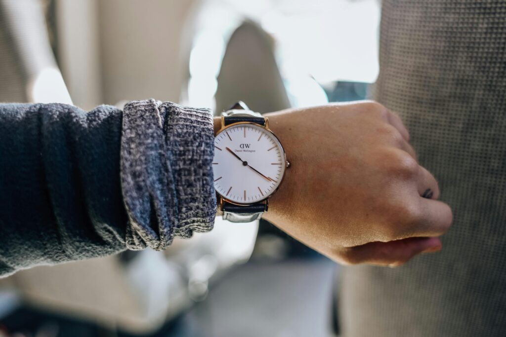 A person checking the watch