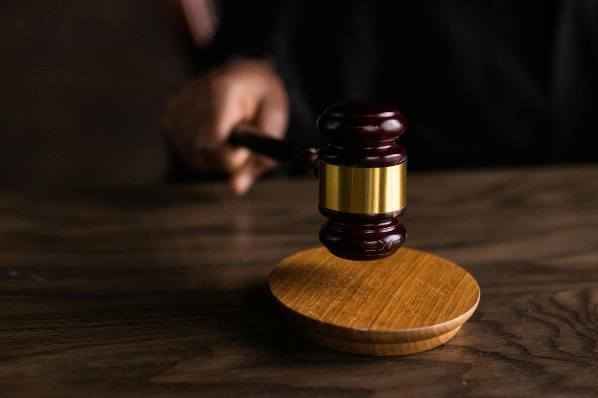 A person holding a gavel