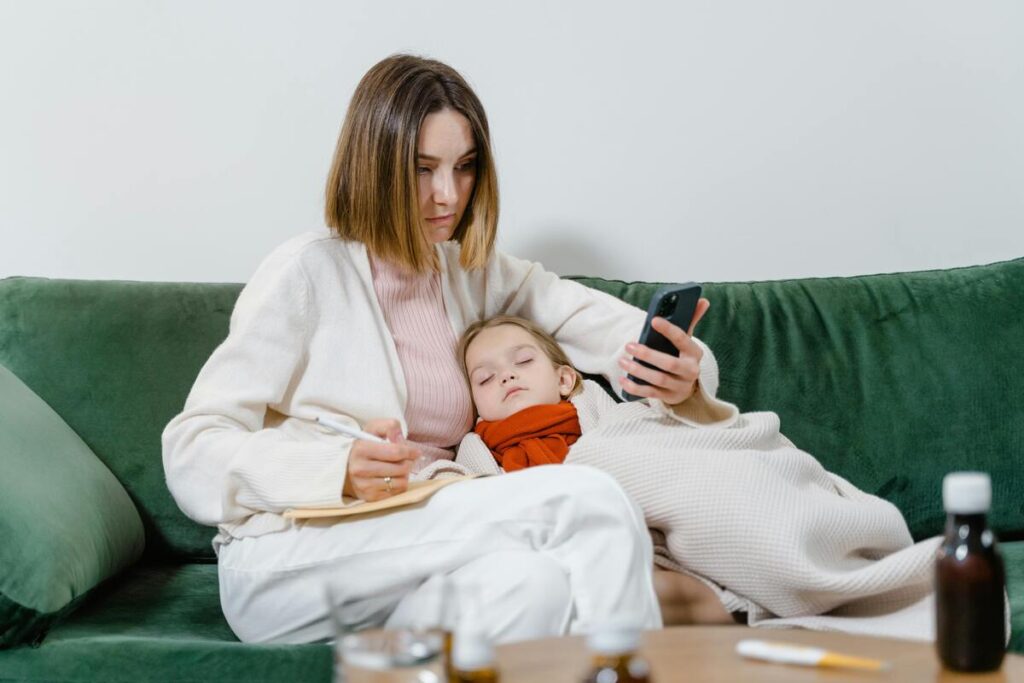 A woman with her sick child