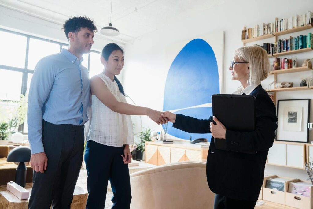 A neuropsychologist shakes hands with her client