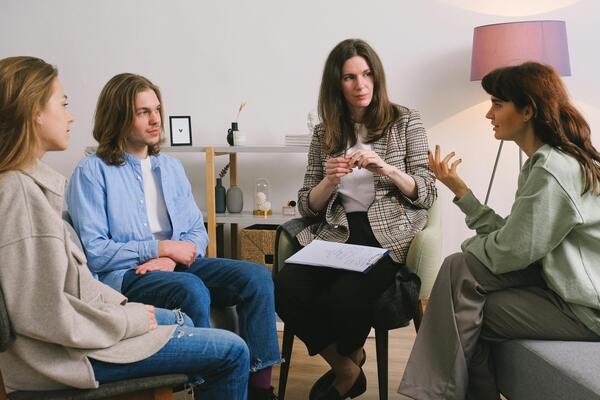 A psychologist explaining to the family