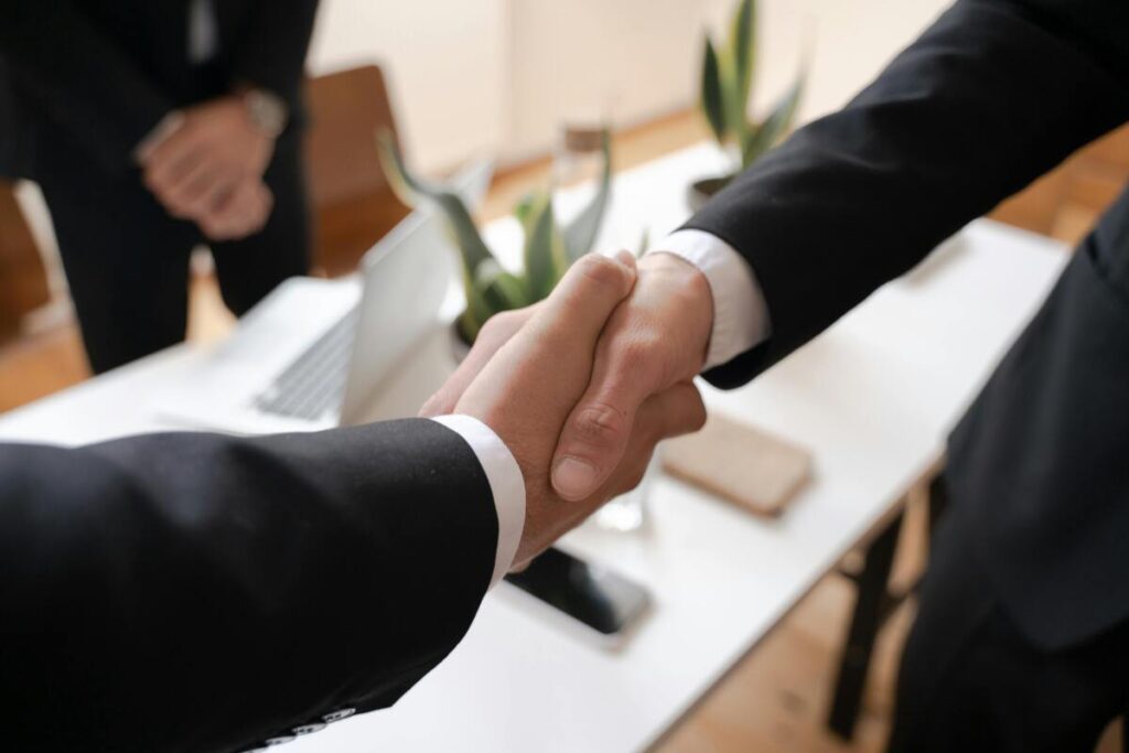 Two people shaking hands