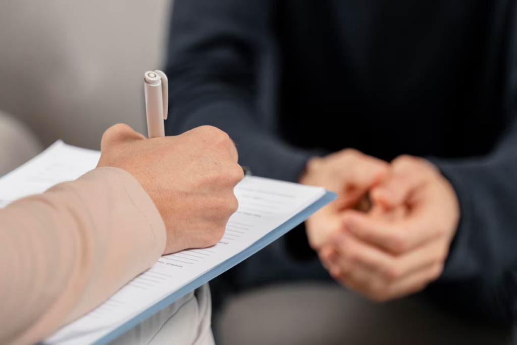 Person conducting a neuropsychological evaluation with a client
