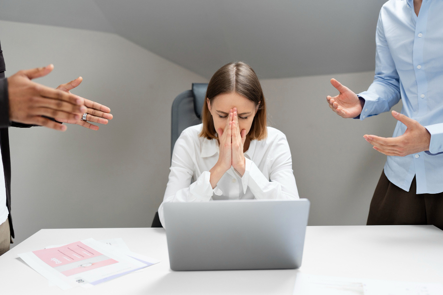 A lady being harassed in work