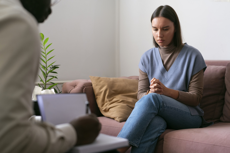 A woman in the middle of therapy session