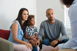 Couples talking to a co-parenting counselor