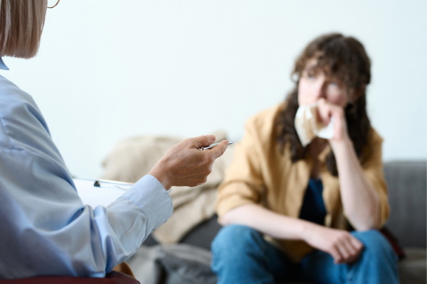 A psychologist explaining the neuropsychological evaluation to the patient.