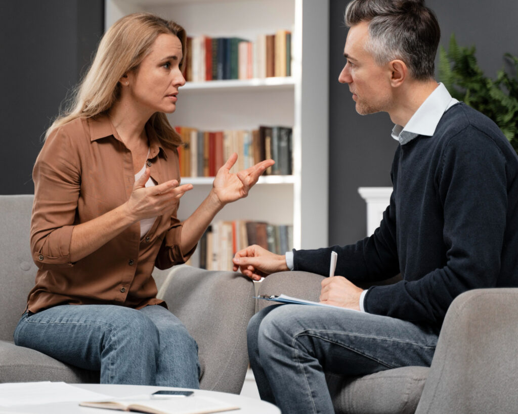 A forensic psychologist talking to a parent.