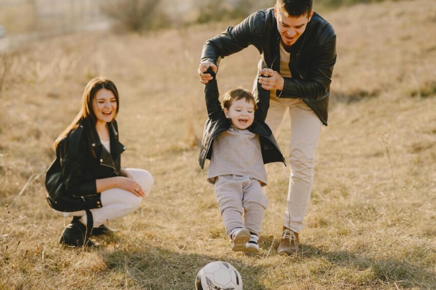 A happy co-parenting with their baby